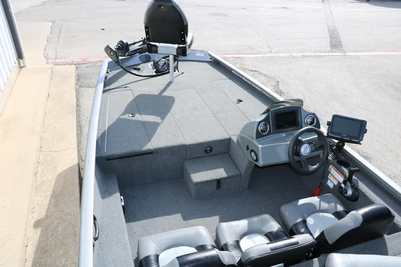 Slide: The Image of 2019 Crestliner VT 18 boat interior with steering console and seating. - 15