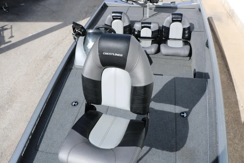 Slide: The Image of 2019 Crestliner VT 18 boat interior with gray and black seating arrangement. - 21