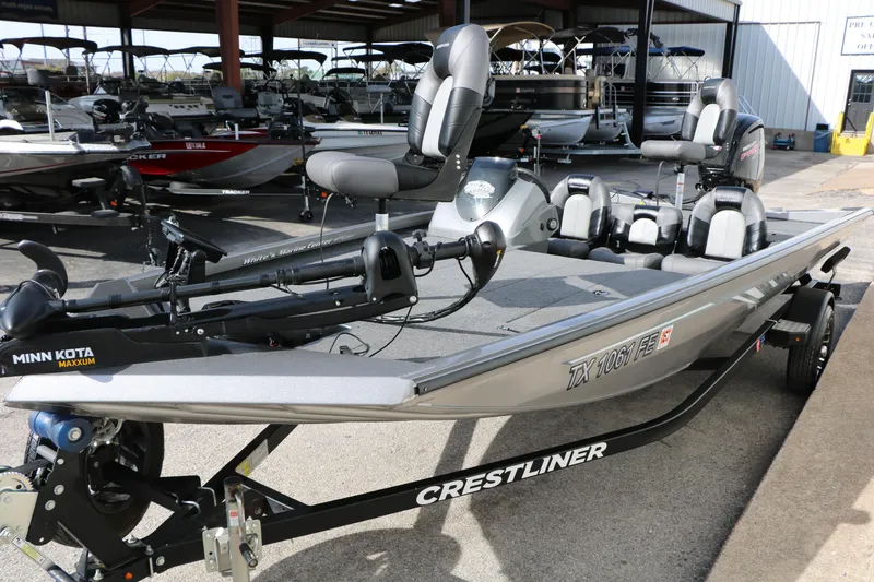 Slide: The Image of 2019 Crestliner VT 18 fishing boat with Minn Kota Maxxum trolling motor in a showroom. - 5