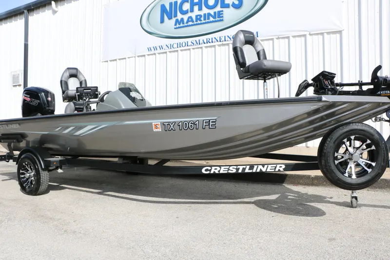 Slide: The Image of 2019 Crestliner VT 18 fishing boat on trailer at Nichols Marine dealership. - 9