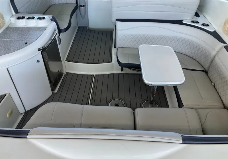 Slide: The Image of Interior of a 2006 Formula 31 Performance Cruiser with seating area and table. - 5