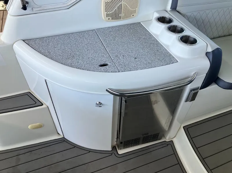 Slide: The Image of 2006 Formula 31 Performance Cruiser with fridge and cup holders. - 9