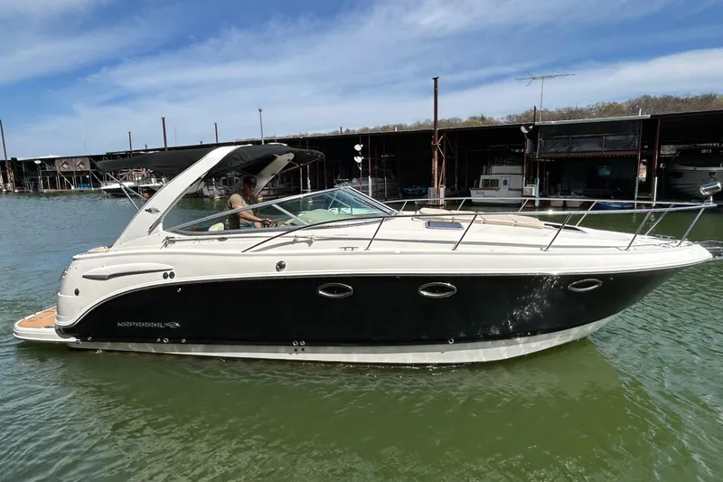 The Image of 2007 Chaparral 330 Signature boat on water near marina. - 0