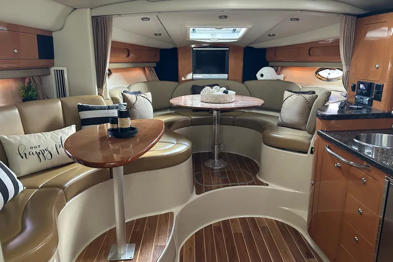 Slide: The Image of Luxurious 2007 Chaparral 330 Signature yacht interior with elegant seating and modern amenities. - 10