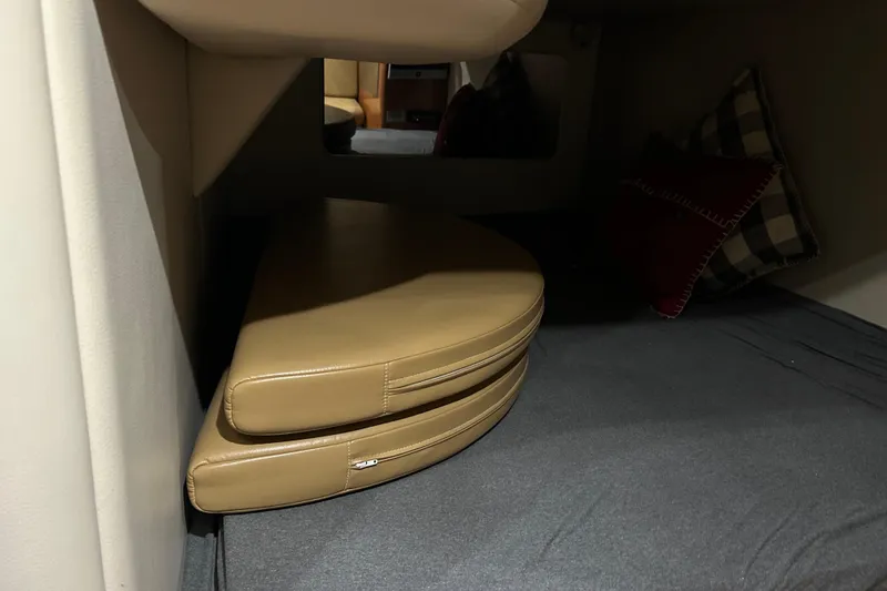 Slide: The Image of 2007 Chaparral 330 Signature cabin interior with cushions and pillows. - 15