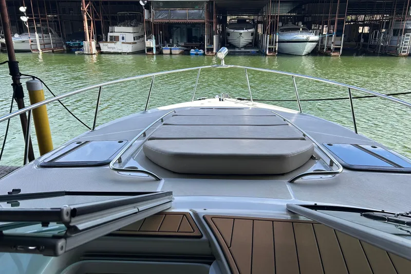 Slide: The Image of 2007 Chaparral 330 Signature boat docked in marina, view from bow deck. - 20