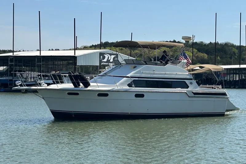 Slide: The Image of Interior of 1989 Carver 380 Santego yacht with TV and seating area. - 21