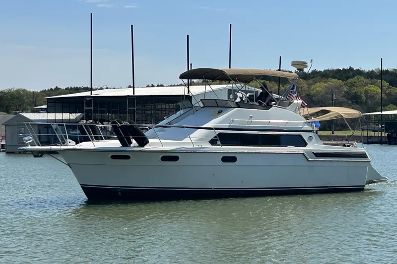 Slide: The Image of Interior of 1989 Carver 380 Santego yacht with cozy seating and modern amenities. - 22