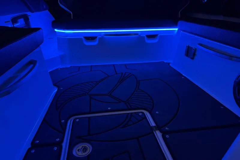 Slide: The Image of Interior of 2022 Scarab 285 ID boat with blue LED lighting. - 109