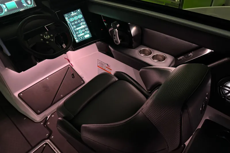 Slide: The Image of 2022 Scarab 285 ID boat interior with modern dashboard and comfortable seating. - 130