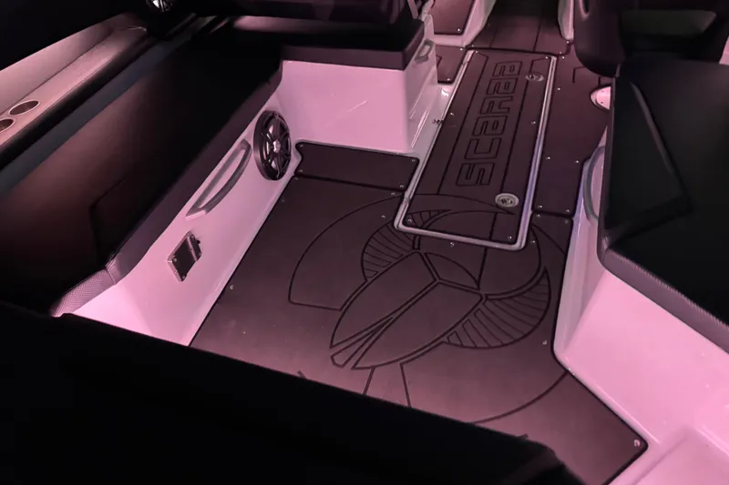 Slide: The Image of Interior of 2022 Scarab 285 ID boat with custom flooring and ambient lighting. - 138