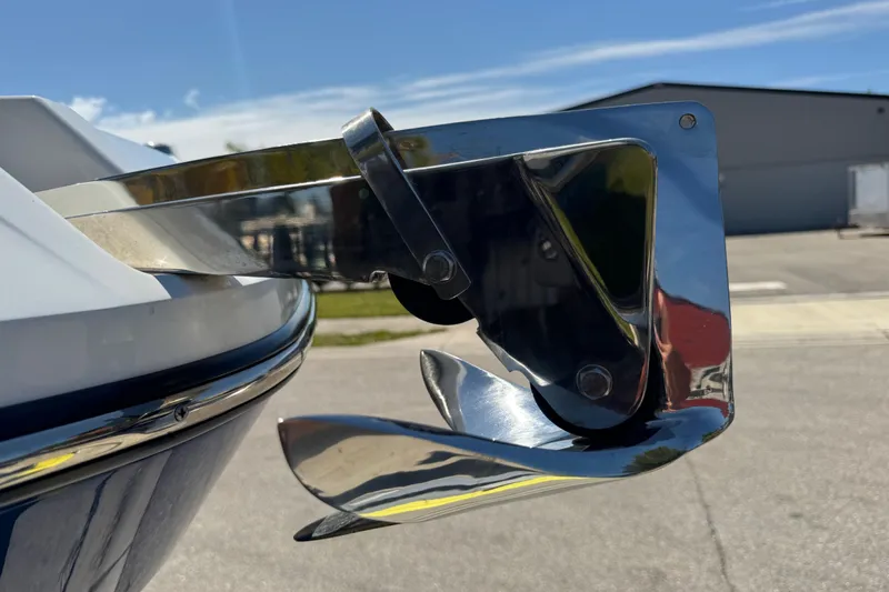 Slide: The Image of Close-up of a 2022 Scarab 285 ID boat anchor in a sunny marina. - 16