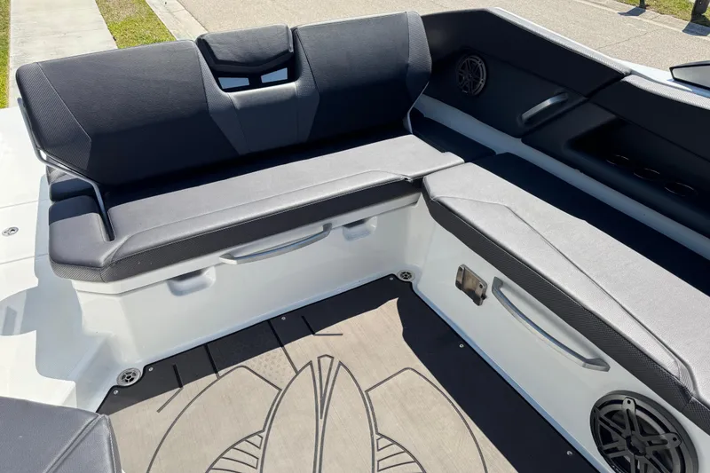 Slide: The Image of 2022 Scarab 285 ID boat interior with sleek seating and modern design. - 25