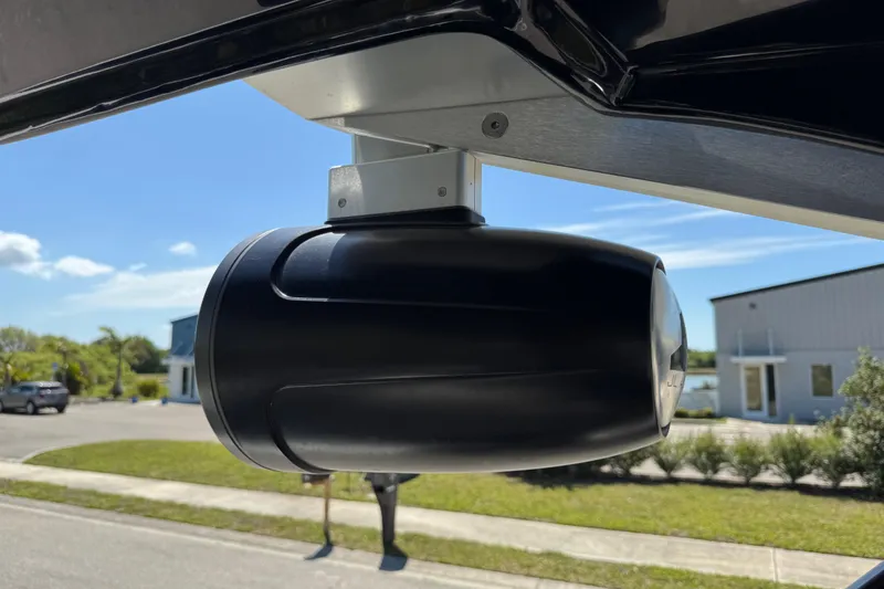 Slide: The Image of 2022 Scarab 285 ID boat speaker mounted outdoors under clear blue sky. - 38