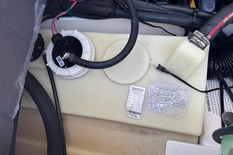 Slide: The Image of 2022 Scarab 285 ID engine compartment with wiring and components visible. - 66