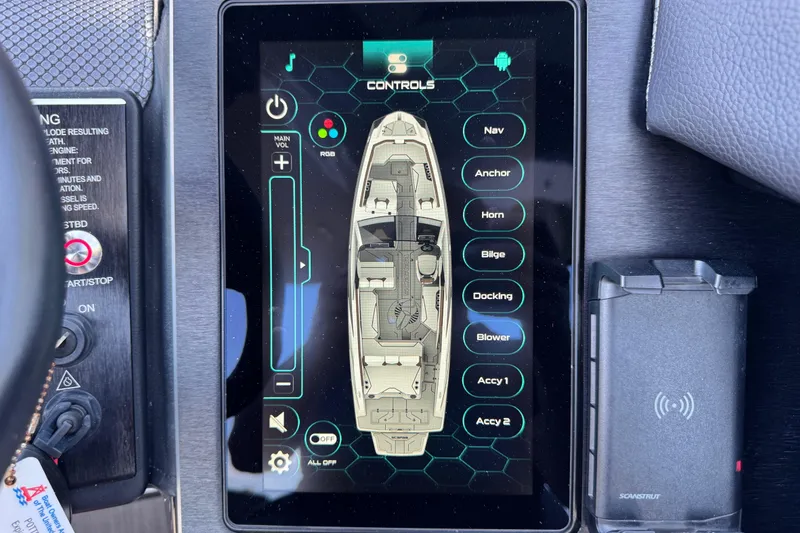 Slide: The Image of Touchscreen control panel of a 2022 Scarab 285 ID boat with navigation and accessory options. - 74
