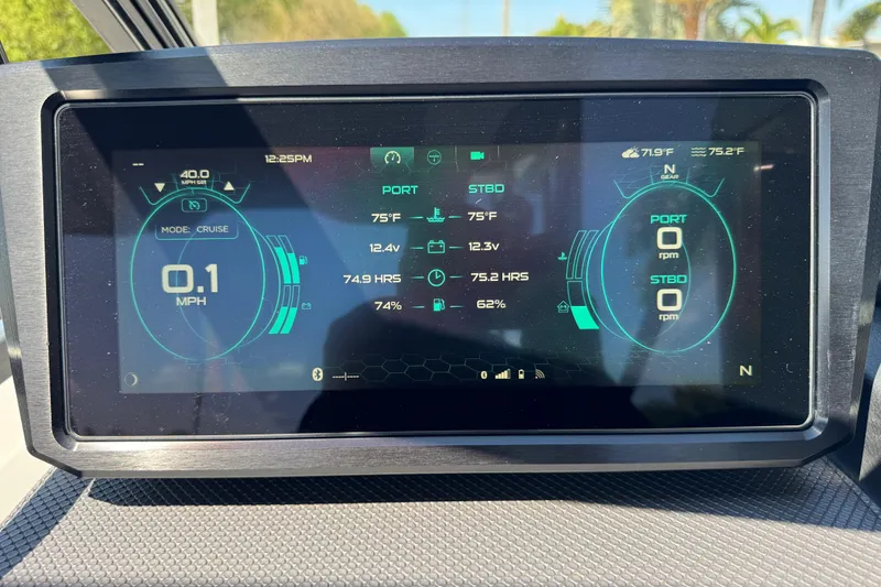 Slide: The Image of Dashboard display of a 2022 Scarab 285 ID boat showing speed, temperature, and engine data. - 75