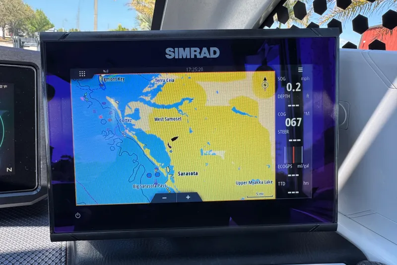 Slide: The Image of Simrad navigation display on 2022 Scarab 285 ID boat, showing Sarasota area map. - 76