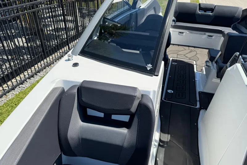 Slide: The Image of 2022 Scarab 285 ID boat interior with sleek seating and modern design. - 85