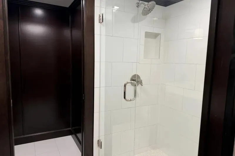 Slide: The Image of Luxurious shower in 2019 Sumerset Houseboat, featuring sleek glass door and modern fixtures. - 10