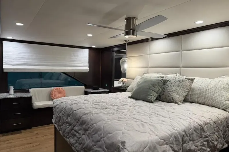 Slide: The Image of Luxurious bedroom interior of 2019 Sumerset Houseboat, featuring modern decor and cozy bedding. - 13