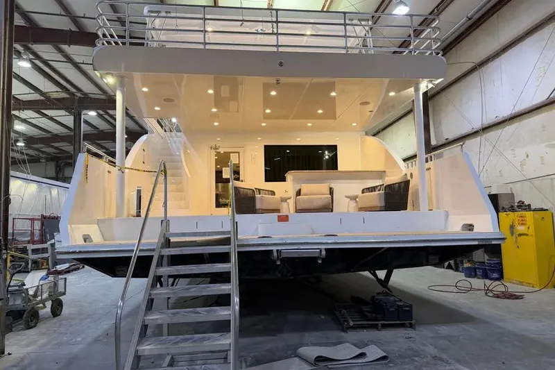 Slide: The Image of Luxurious 2019 Sumerset Houseboat 20' x 100' in a spacious indoor facility. - 22