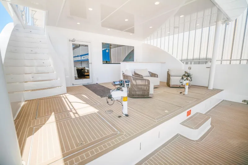 Slide: The Image of Luxurious 2019 Sumerset 20x100 houseboat interior with modern seating and elegant design. - 28