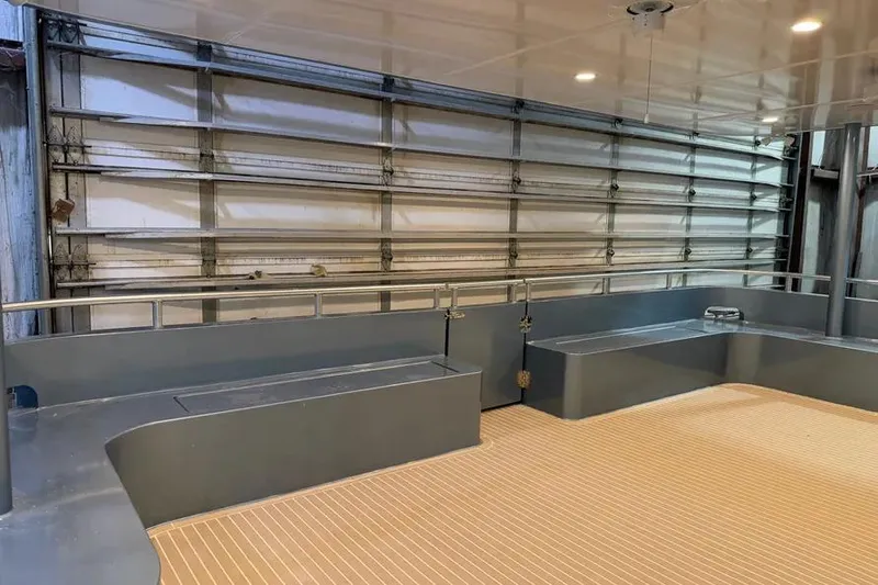 Slide: The Image of Interior of a 2019 Sumerset Houseboat, featuring spacious seating and modern design. - 3