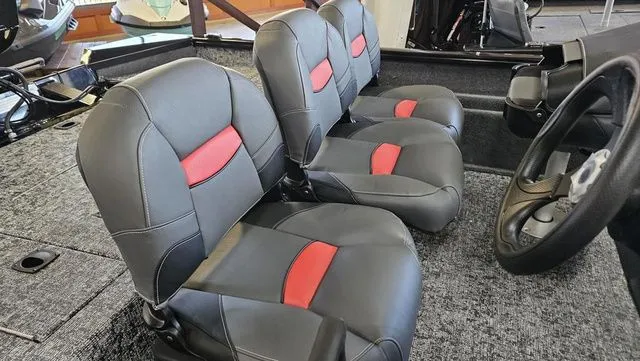Slide: The Image of Interior of 2026 Tracker Pro Team 175 TF with gray and red seats. - 5