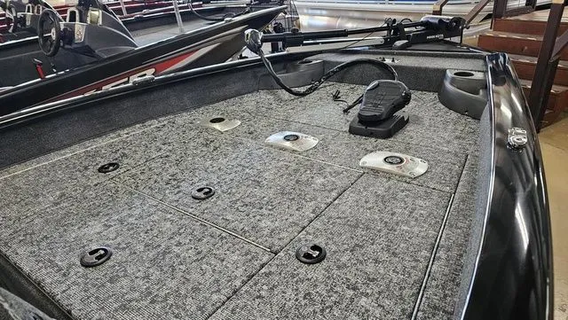 Slide: The Image of 2026 Tracker Pro Team 175 TF boat deck with gray carpet. - 9