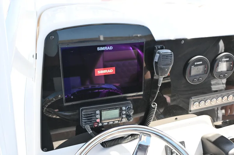 Slide: The Image of Dashboard of a 2017 Tidewater 210 LXF boat with Simrad electronics. - 10