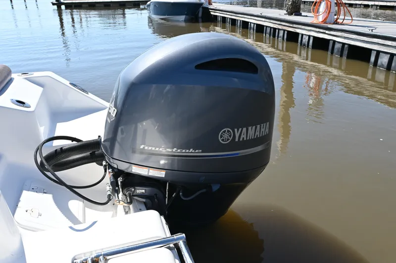 Slide: The Image of Yamaha four-stroke engine on 2017 Tidewater 210 LXF boat at dockside. - 11