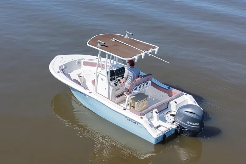 Slide: The Image of 2017 Tidewater 210 LXF boat with Yamaha engine on calm water. - 4