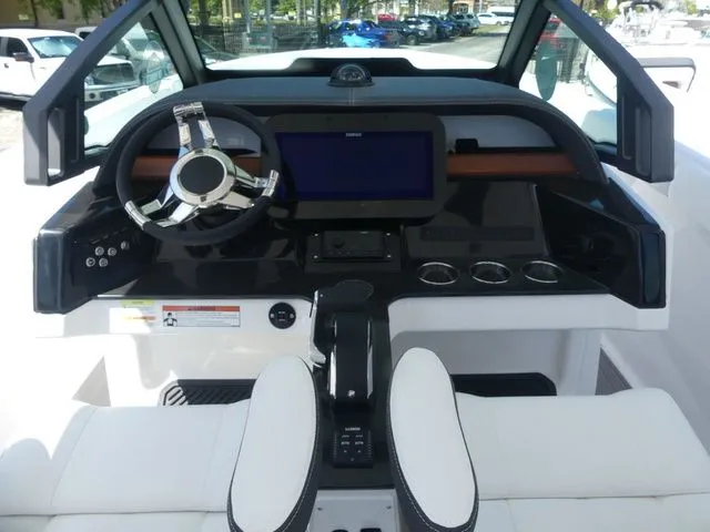 Slide: The Image of Interior view of 2026 Monterey Elite 25 OB boat cockpit. - 10