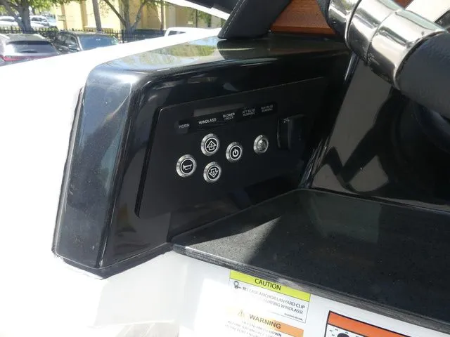 Slide: The Image of Control panel of the 2026 Monterey Elite 25 OB boat. - 13