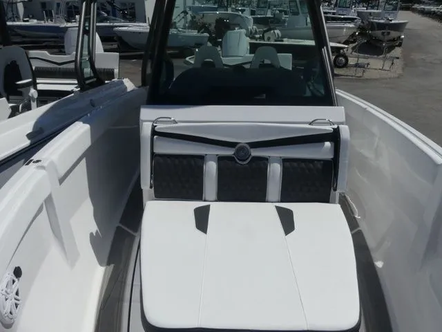 Slide: The Image of Interior of Monterey Elite 25 OB boat, model year 2026. - 20