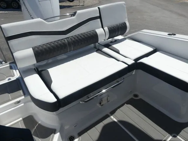 Slide: The Image of 2026 Monterey Elite 25 OB boat seating with modern design. - 7
