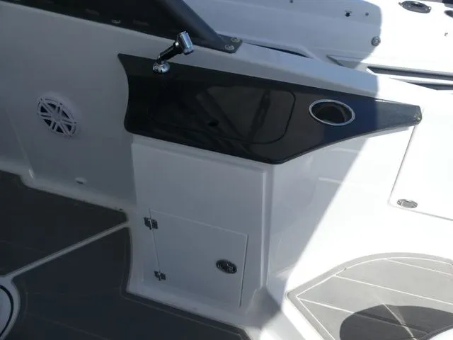 Slide: The Image of Interior of 2026 Monterey Elite 25 OB with black countertop. - 9