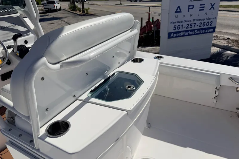 Slide: The Image of 2019 Everglades 253 Center Console boat interior with seating and control panel. - 11