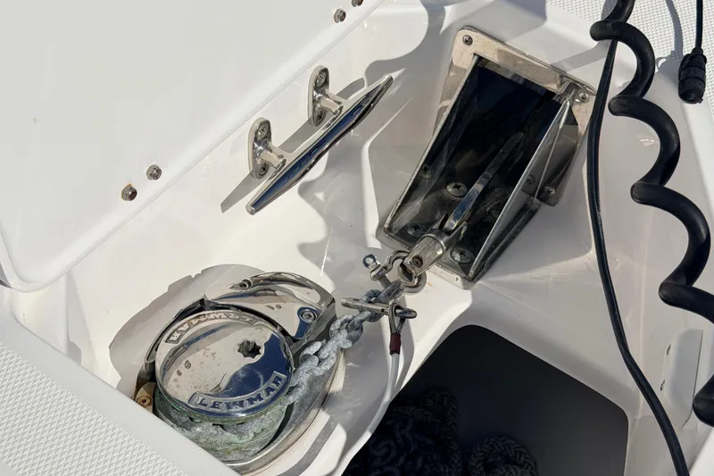Slide: The Image of Anchor compartment of 2019 Everglades 253 Center Console boat with windlass system. - 26
