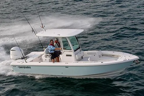 Slide: The Image of Manufacturer Provided Image: 2019 Everglades 253 Center Console boat cruising on the water with two people onboard. - 29