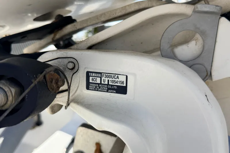 Slide: The Image of Close-up of Yamaha F300UCA engine part on 2019 Everglades 253 Center Console boat. - 31