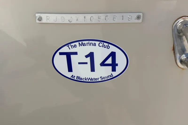 Slide: The Image of 2019 Everglades 253 Center Console with T-14 Marina Club sticker at BlackWater Sound. - 32