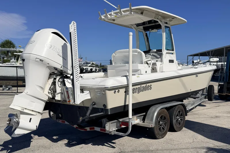 Slide: The Image of 2019 Everglades 253 Center Console boat on trailer with Yamaha outboard motor. - 6