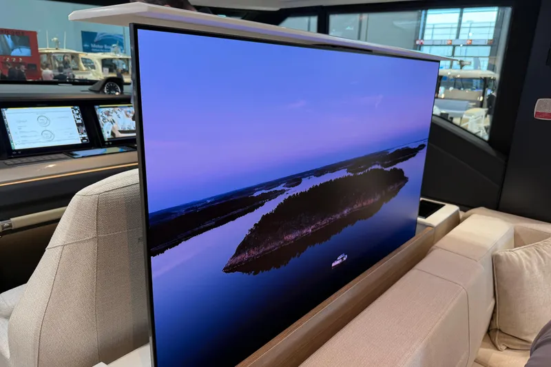 Slide: The Image of Luxurious interior of 2026 Saxdor 460 GTC with large screen displaying scenic view. - 13