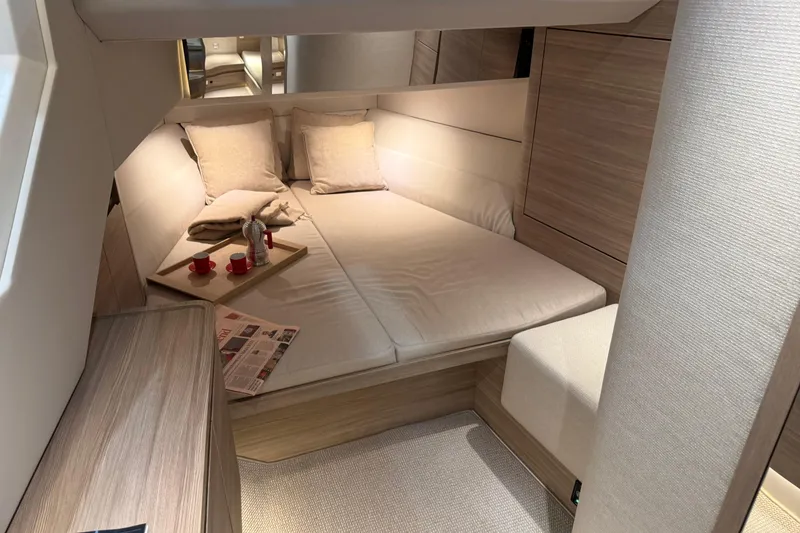 Slide: The Image of Luxurious interior cabin of 2026 Saxdor 460 GTC yacht with cozy bedding and modern decor. - 18