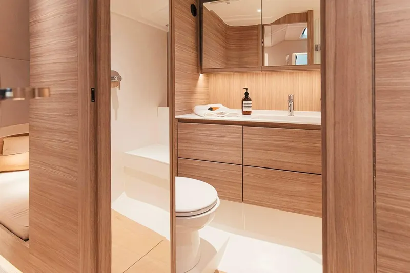 Slide: The Image of Luxurious bathroom interior of 2026 Saxdor 460 GTC yacht with modern wood finish. - 20