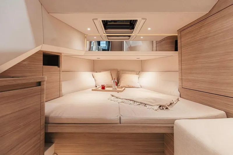 Slide: The Image of Luxurious interior cabin of 2026 Saxdor 460 GTC yacht with cozy bedding and modern design. - 25