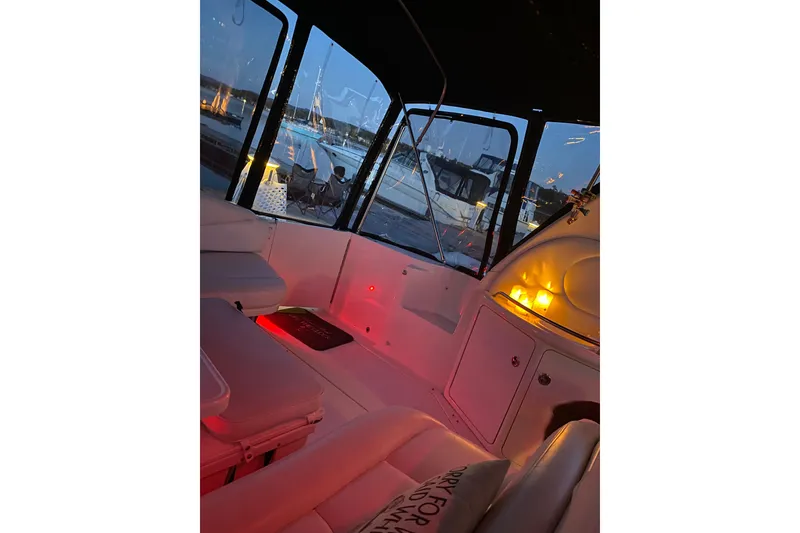 Slide: The Image of Interior of a 2001 Sea Ray 380 Sundancer yacht with ambient lighting. - 13
