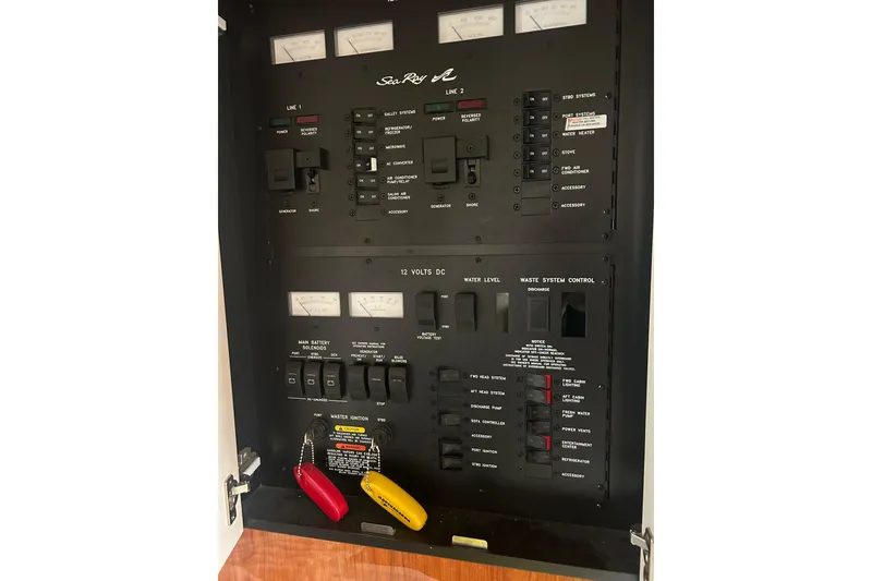 Slide: The Image of Electrical control panel of a 2001 Sea Ray 380 Sundancer boat. - 20